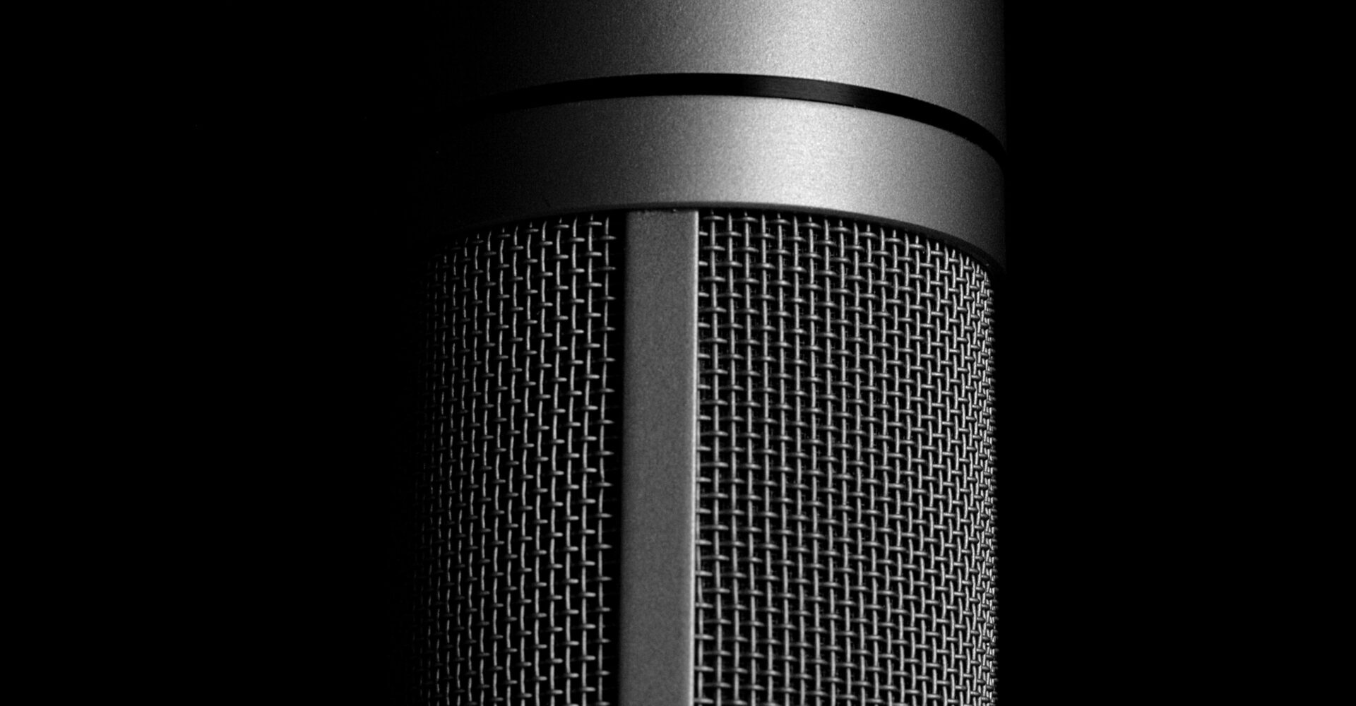 A hanging microphone to represent interviewing