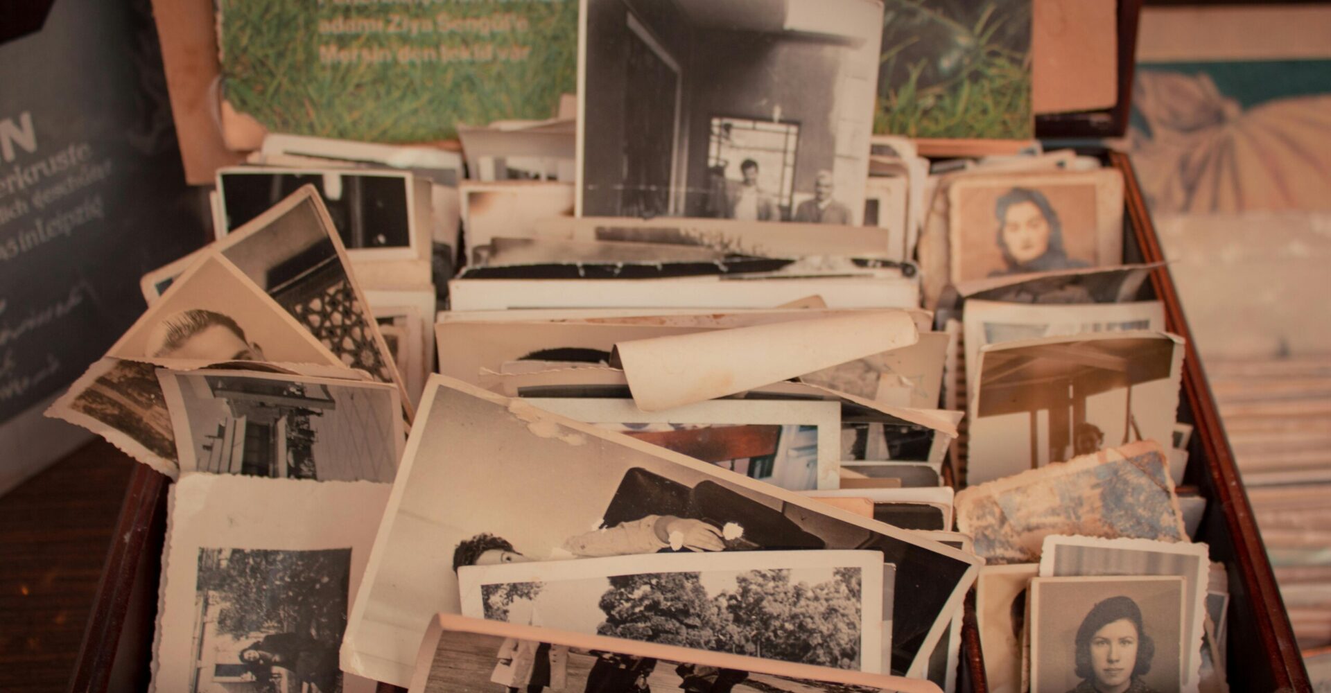 A box containing a range of old photos